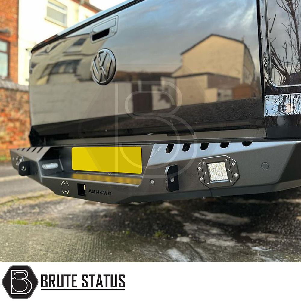 Volkswagen Amarok 2017-2022 Rear Bumper Matt Black, showcasing a stylish and durable design with integrated lights, enhancing the rear exterior of the truck.