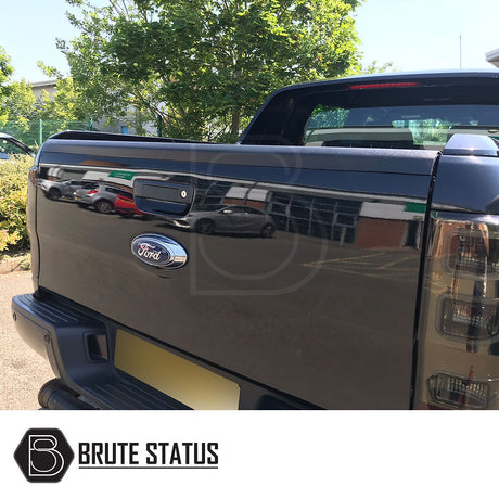 Ford Ranger 2012-2022 T6 T7 T8 Tailgate Protector/Cover shown on the back of a black truck, highlighting its smooth black finish and seamless fit.