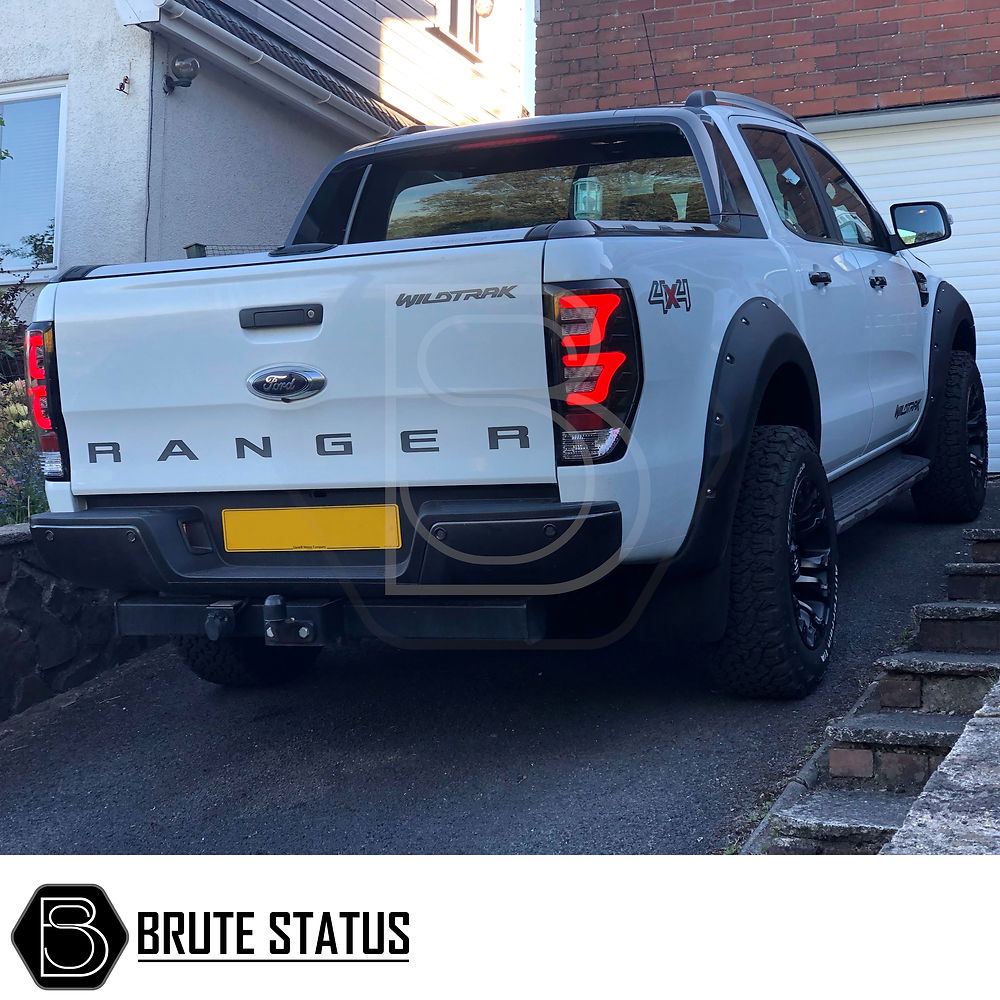 Ford Ranger 2012-15 Wide Arch Kit & 50mm Wheel Spacers shown installed on a white truck, highlighting the muscular, enhanced appearance and fit.