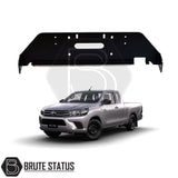 Toyota Hilux 2015-2020 Front Bumper Winch Bracket, shown fitted on a silver truck under a metal frame, suitable for aftermarket customization.