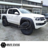 VW Amarok 2010-2017 Heavy Duty S30 Steel Side Steps with LEDs, mounted on a white truck, showcasing durable construction and sleek matt black finish.