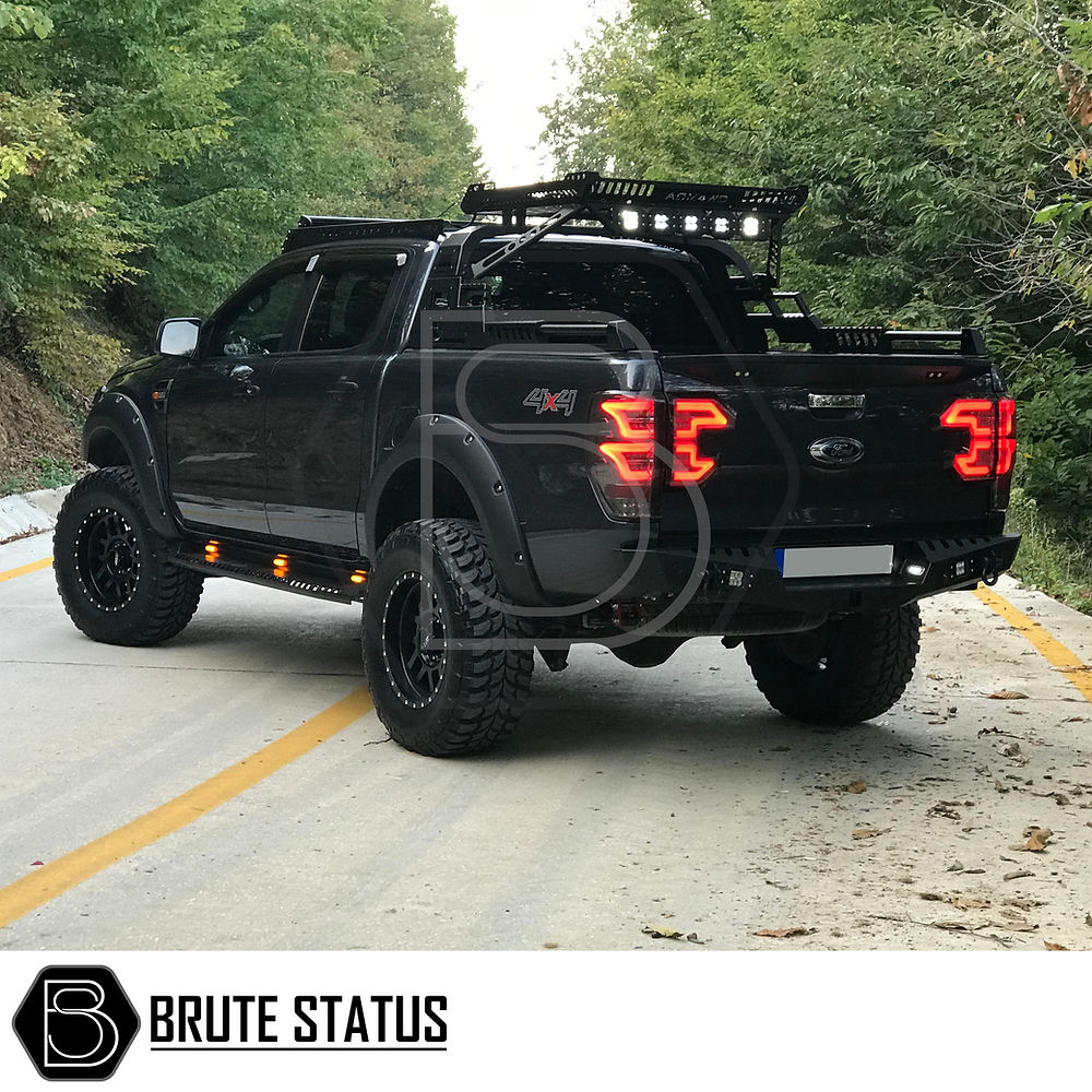 Ford Ranger 2012-2022 Heavy Duty S30 Steel Side Steps With LEDs, shown fitted on a black truck, featuring close-up views of tires and integrated LED lights.