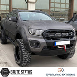 Ford Ranger 2012-2022 Matte Black Wide Arch Kit with riveted style, shown on a parked truck, highlights robust wheel arches and precise fitment for double cab models.