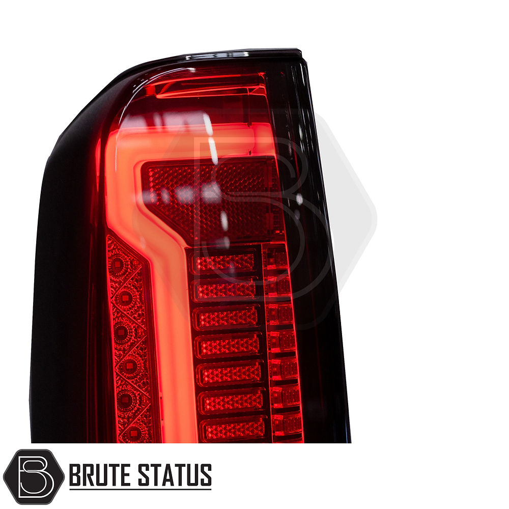 Nissan Navara D40 2006-2014 LED Tail Lights, aftermarket design, close-up showcases red LED detailing, ideal for enhancing truck's rear appearance.