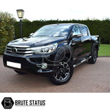 Toyota Hilux 2018-2020 Wheel Arch Kit (Riveted Style) on a black truck, showcasing durable, stylish wide arches with a textured black finish.