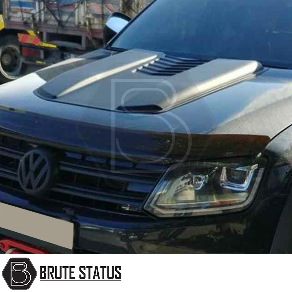 Nissan Navara D40 2006-2014 Bonnet Scoop, featuring a durable ABS plastic design with a matt black finish for enhanced vehicle customization.