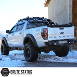 Ford Ranger 2023+ X10 Combat Roll Bar with LED Lights, visible in snowy setting, emphasizes aggressive design with heavy-duty construction and matt black finish.