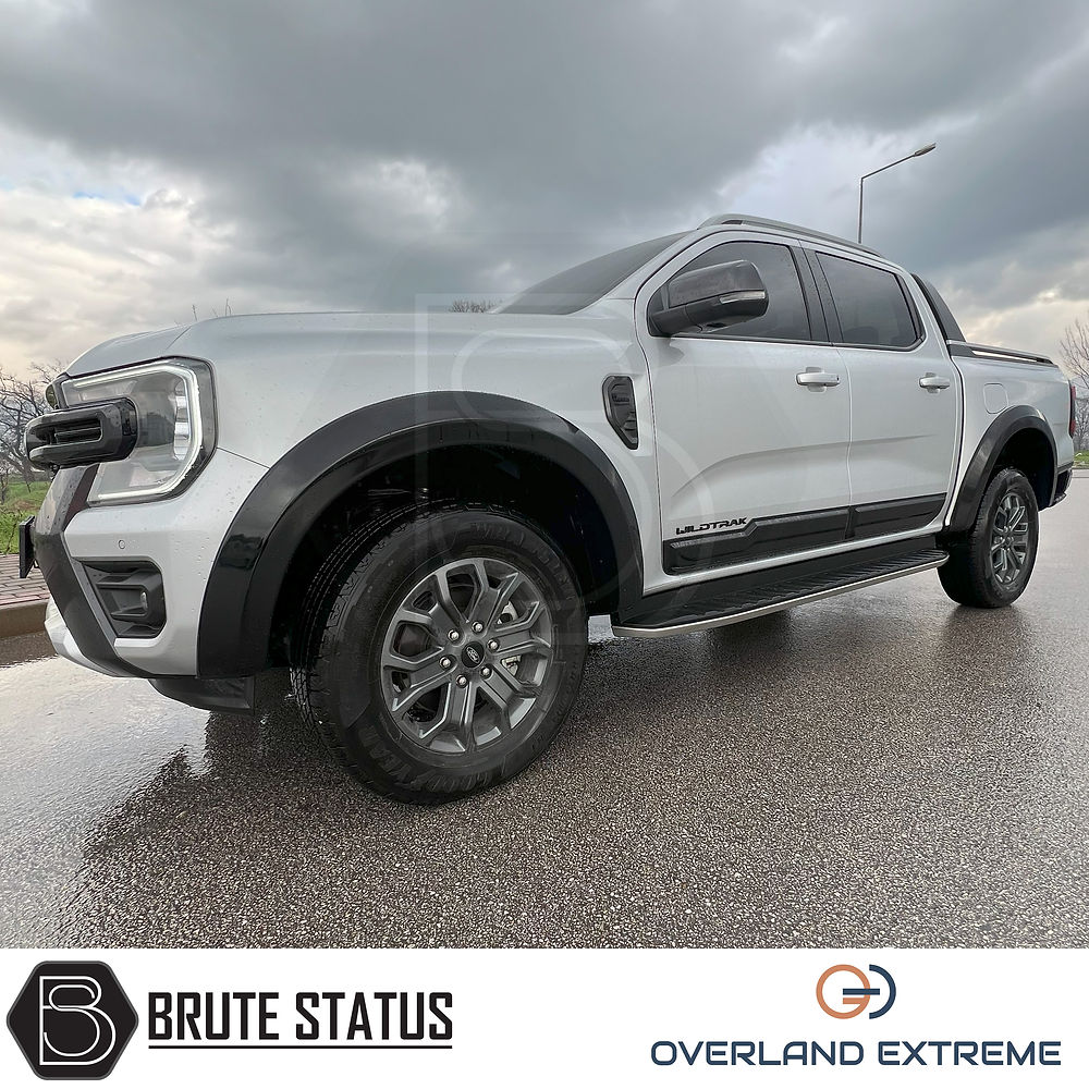 Ford Ranger 2023+ T9 Gloss Black Wide Arch Kit displayed on a white truck, showcasing premium ABS plastic wheel arches designed for durability and customization.