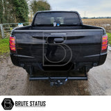 Mitsubishi L200 2015-19 LED Tail Lights on a black truck, showcasing sleek design and advanced LED technology for enhanced visibility and style.