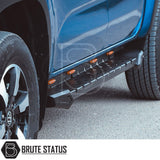 Isuzu D-Max 2021+ Heavy Duty M30 Steel Side Steps, matt black finish, shown mounted on a blue truck, highlighting tire and vehicle side details.