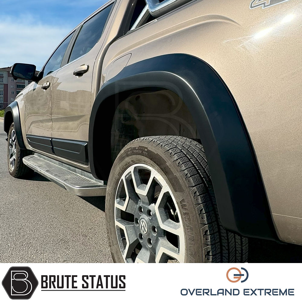 Volkswagen Amarok 2023+ Matte Black Wide Arch Kit, featuring premium ABS plastic and precise fitment, enhancing vehicle style with durable, UV-resistant wheel arches.