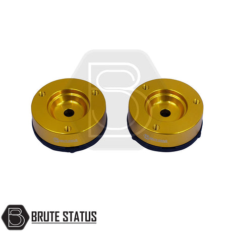 Isuzu D-Max 2021+ 32mm Front Shock Spacers, gold metal with holes, enhancing truck lift and durability, featuring pre-installed studs and nuts for easy installation.