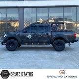 Nissan Navara D40 2005-2010 (Pre-Facelift) Overland Extreme Wide Arch Kit displayed on a black truck, highlighting premium wheel arches and rugged styling.