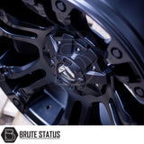 Close-up of a Fuel Vapor Wheel's black rim, showcasing its intricate design and logo, perfect for enhancing your vehicle's style and performance.