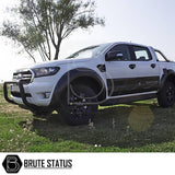 Nissan Navara NP300 2015-2022 Bull Bar in matt black, enhancing truck protection and style, shown on a white truck parked on grass.