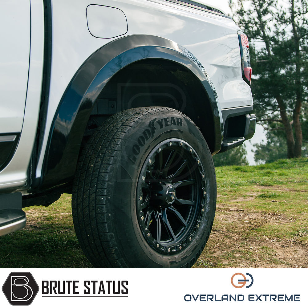 Ford Ranger 2023+ T9 Gloss Black Wide Arch Kit, showcasing a premium tire close-up, illustrating the Overland Extreme's precision fit and durable ABS plastic design.