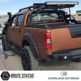 Nissan Navara D40 2010-2015 Overland Extreme Wide Arch Kit installed on a brown truck, showcasing enhanced, premium wheel arches for double cab models.