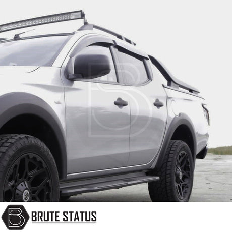 Mitsubishi L200 Series 5 2015-2019 Window Deflector Sun Shade, enhancing aerodynamics with durable, scratch-resistant acrylic for optimal rain protection and style.