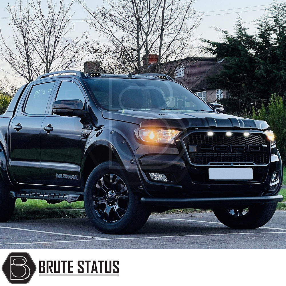 Ford Ranger Black Roof Rail Kit 2012-2022 displayed on a parked black truck, emphasizing its high-quality finish and compatibility with 2012-2022 models.