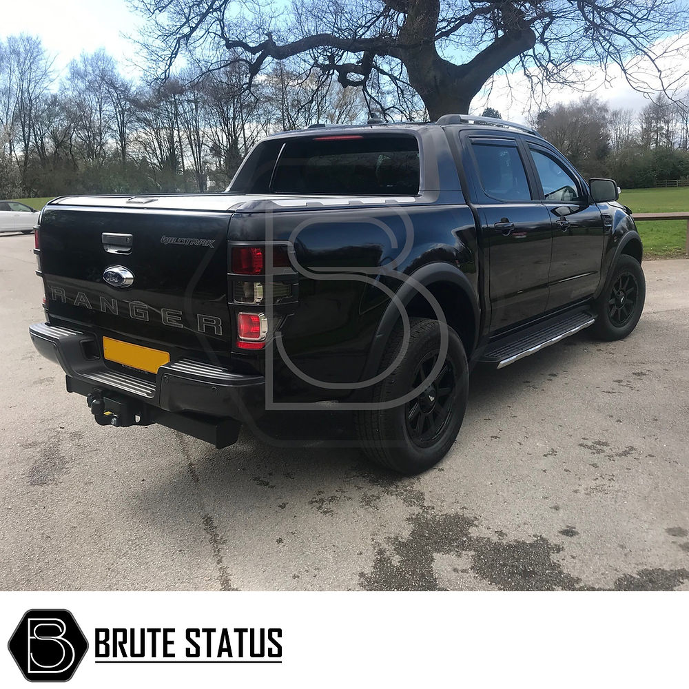 Ford Ranger 2015-2022 T7 T8 Wide Arch Kit - Slim Style installed on a parked black truck, highlighting the sleek wheel arch fender flares.