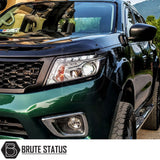 Nissan Navara 2015-2022 NP300 D23 Headlight Cover Guard Matte Black, enhancing truck's aggressive look with easy-fit, durable ABS plastic for customization.