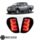 Mitsubishi L200 MK4 2006-14 LED Tail Lights, showcasing clear lenses with white accents, designed for easy installation on series 4 models, enhancing truck aesthetics.