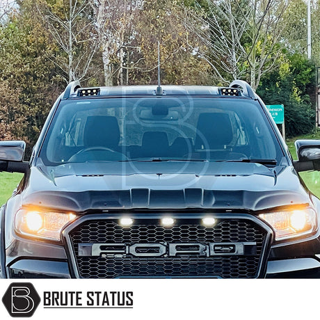 Ford Ranger Black Roof Rail Kit 2012-2022, showcased on a black truck, enhances style and function. Ideal for customizing your vehicle.