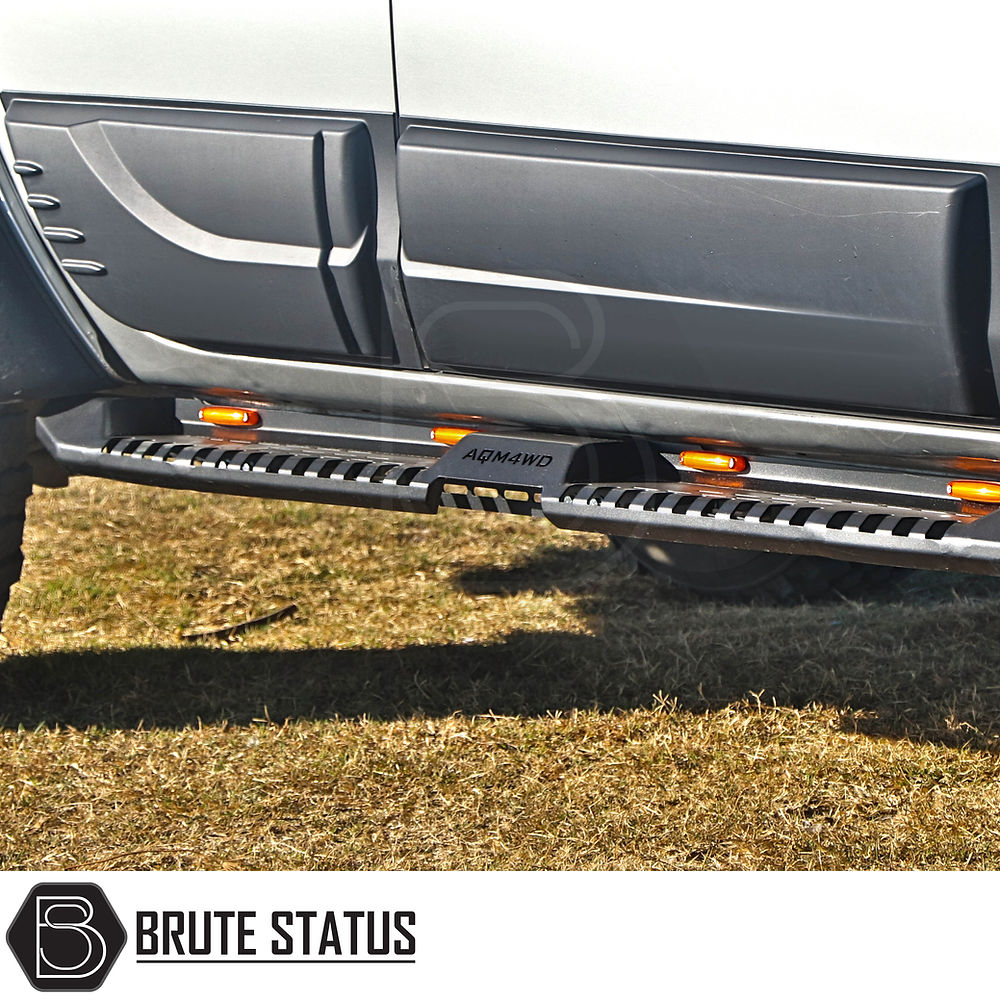 Isuzu D-Max 2021+ Heavy Duty S32 Steel Side Steps with LEDs, shown attached to a truck, emphasizing durability and sleek matt black finish.