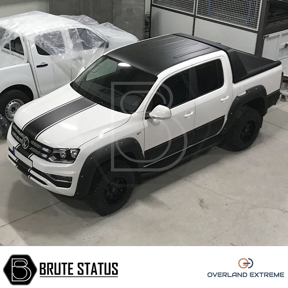 VW Amarok 2017+ Wide Arch Kit (Overland Extreme) featuring durable ABS plastic wheel arches designed for enhanced fit and style, shown on a white pickup truck.