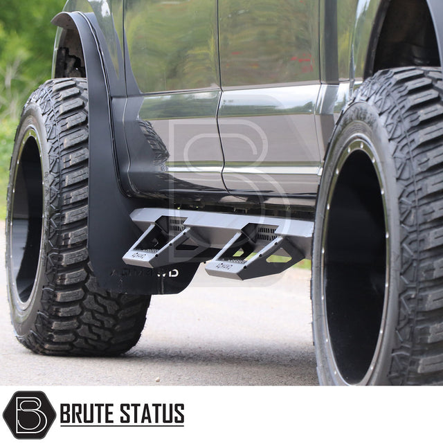 Volkswagen Amarok 2023+ Heavy Duty T32 Steel Side Steps shown in close-up, highlighting durable matt black steel construction and side protection features.