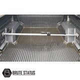 Load Bay Cargo Bar in a truck bed, featuring a central ratchet mechanism and adjustable galvanized metal for secure cargo support in pick-up trucks.