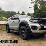 Ford Ranger 2019-2022 black grille with white LEDs showcased on a silver truck, highlighting its rugged design and precise fit for Wildtrak models.