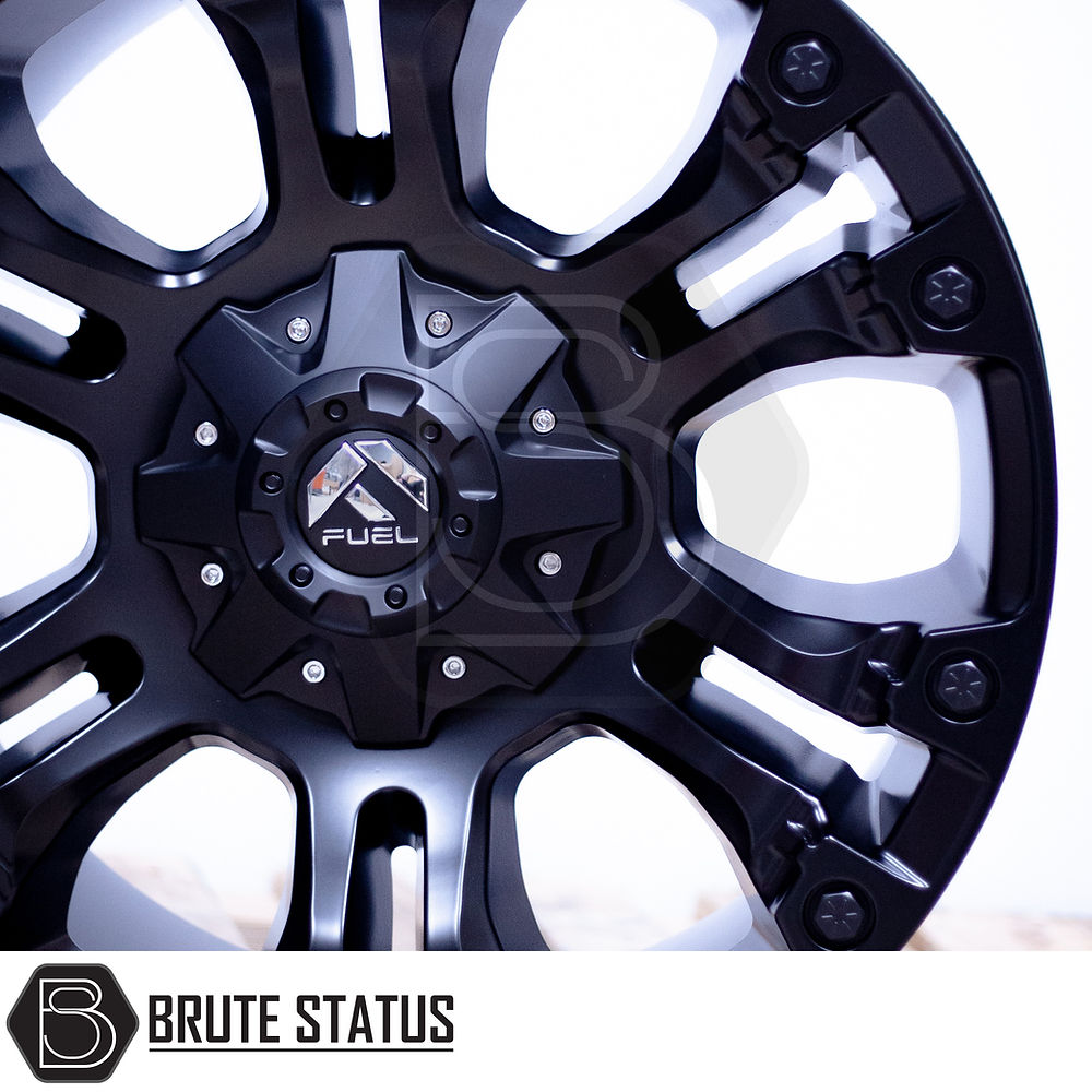 Fuel Vapor Wheels in Matte Black, featuring a close-up of the stylish black rim design, ideal for enhancing pick-up truck aesthetics.