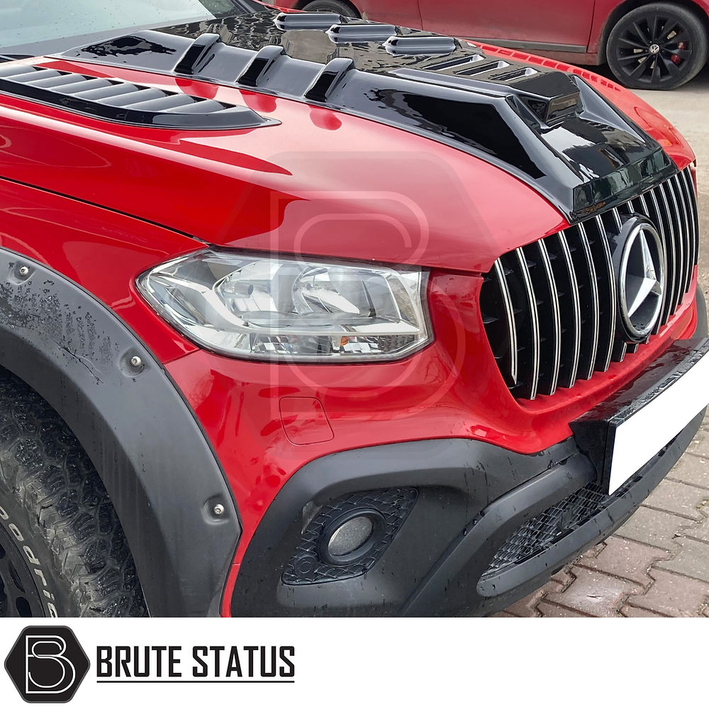 Mercedes X-Class 2017-2020 Bonnet Scoop, a durable ABS plastic accessory for enhanced vehicle style and performance, shown in a close-up of car exterior elements.