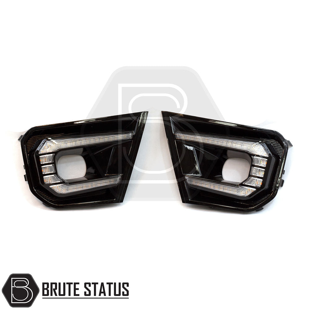 Ford Ranger 2023+ Wildtrak DRL Fog Light Surrounds with gloss black finish and LED function, designed for easy fitment using existing mounting points.