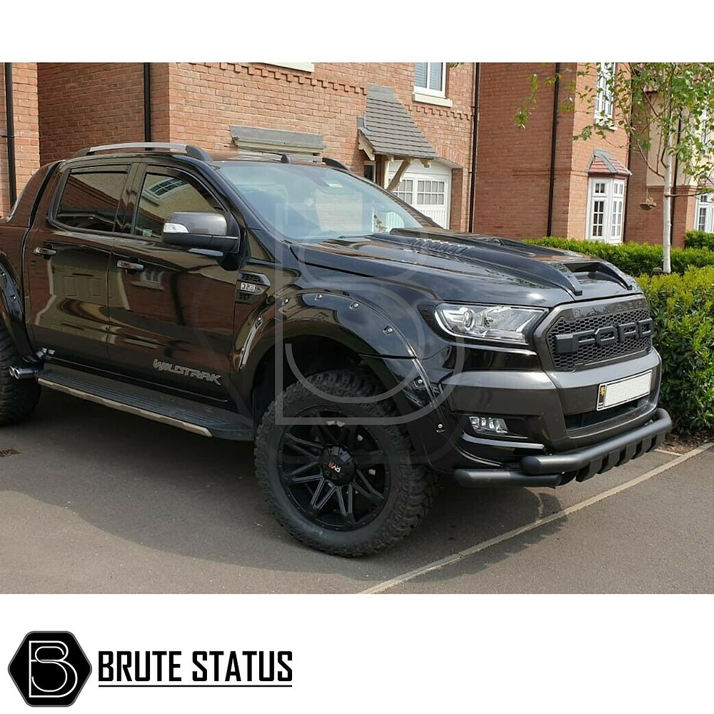 Ford Ranger 2015-2022 City Bar (Nudge Bar) Matte Black enhances truck style and bumper protection, shown on a black truck parked by a brick building.