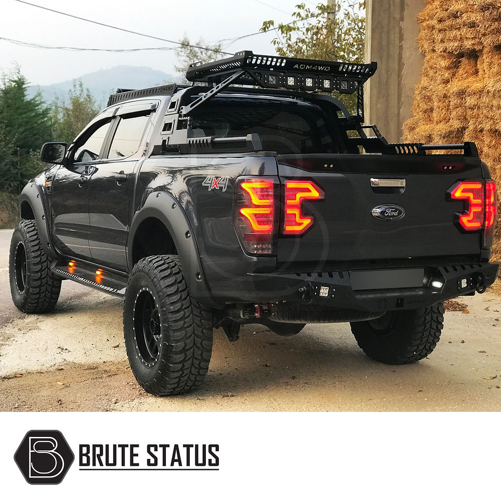 Ford Ranger 2012-2022 Rear Bumper Matt Black with integrated lights and knock-out holes for parking sensors, enhancing style and protection.