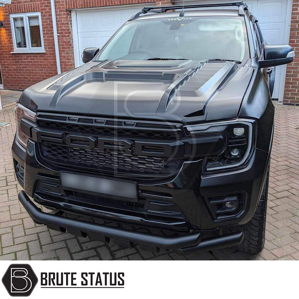 Ford Ranger 2023+ 'The Beast II' Bonnet Scoop on a black truck, enhancing its rugged appearance with a smooth finish and easy adhesive installation.