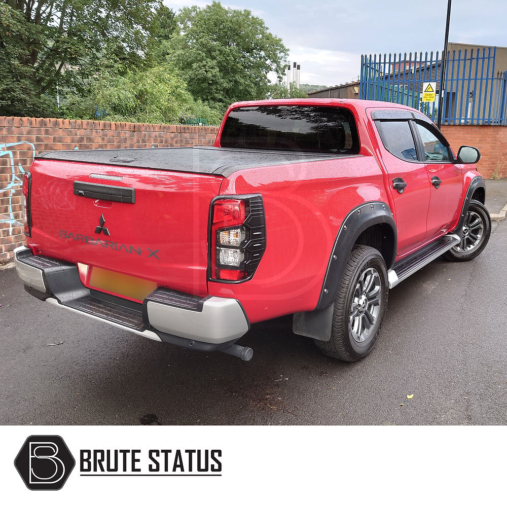 Mitsubishi L200 Series 6 2019+ Fender Flares enhance truck style with wide arches, durable ABS plastic, and no-drill installation, shown on a parked red truck.