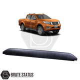 Nissan Navara NP300 2015-2022 Tailgate Protector/Cover, black, designed to fit seamlessly with bed liners and accessories, featuring impact-resistant plastic and adhesive installation.