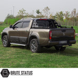 Isuzu D-Max 2012-2021 Combat Roll Bar on parked truck, showcasing its heavy-duty steel construction and matt black finish.