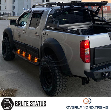 Nissan Navara D40 2010-2015 Overland Extreme Wide Arch Kit showcased on a truck, highlighting premium wheel arches for enhanced vehicle style and durability.