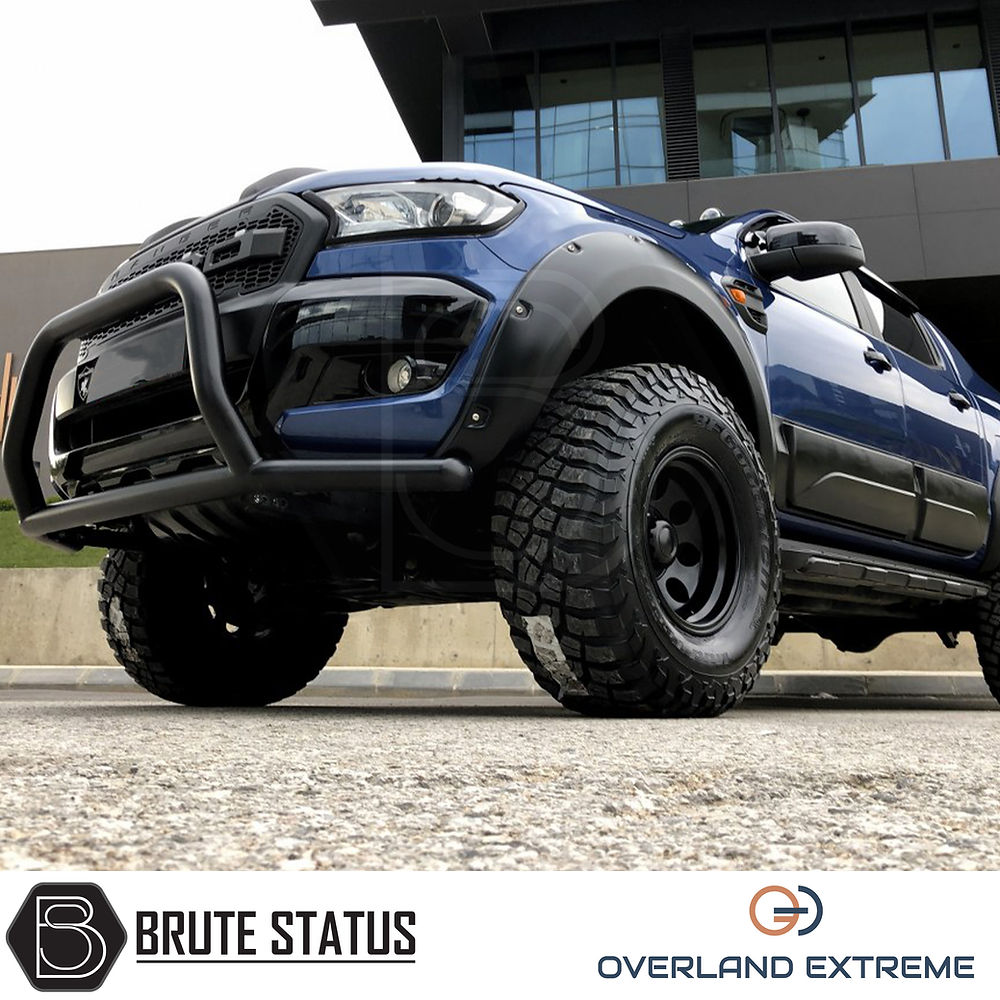 Ford Ranger 2012-2022 Matte Black Wide Arch Kit (Overland Extreme) Riveted Style, showing robust wheel arch extensions designed for durability and enhanced vehicle aesthetics.