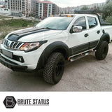 Fiat Fullback 2015-2019 Bonnet Scoop on a white truck, showcasing its aggressive design and smooth black finish for enhanced individuality.