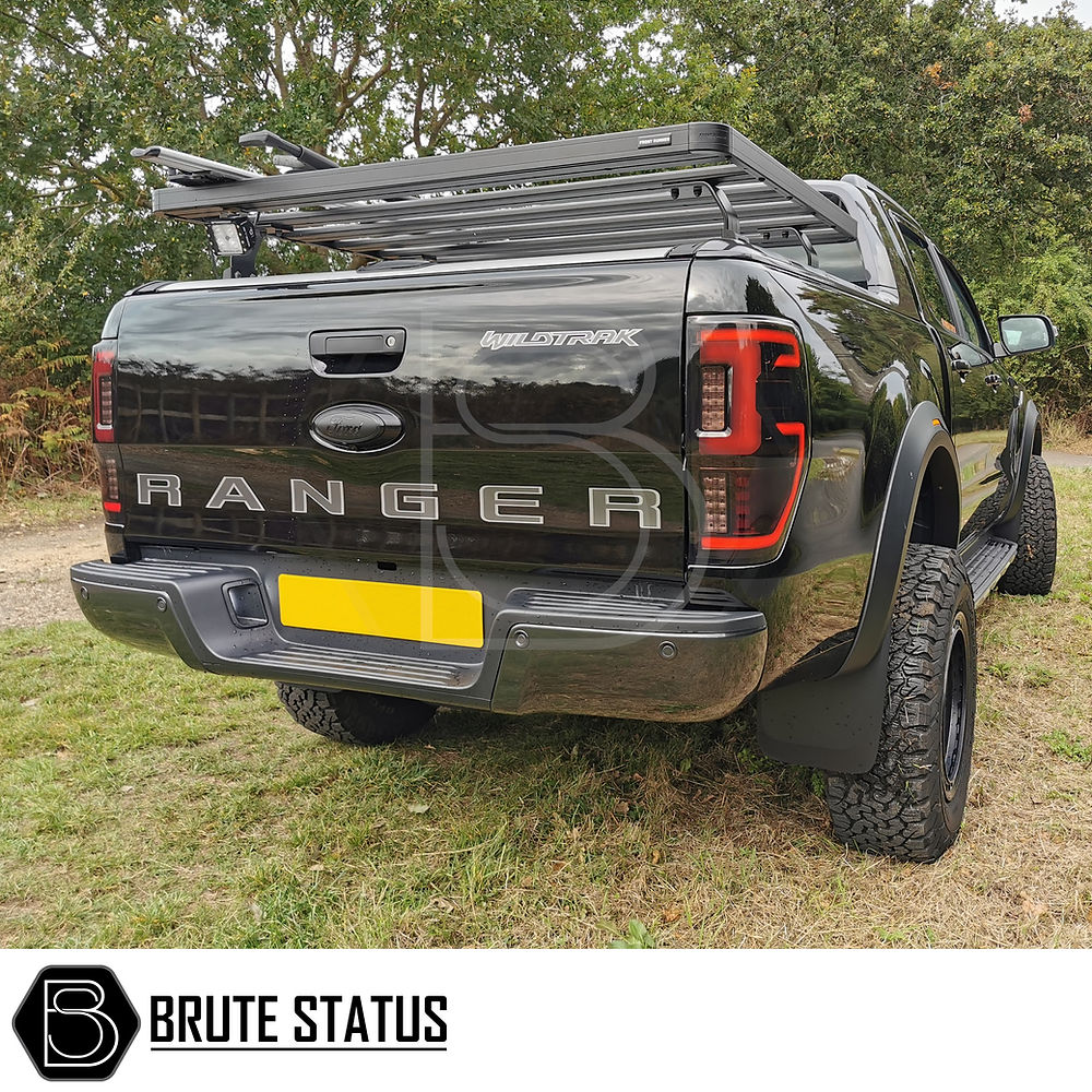 Ford Ranger 2012-2022 LED Rear Tail Lights (UK Spec) installed on a black truck, showcasing the sleek design and integration with existing tail light points.