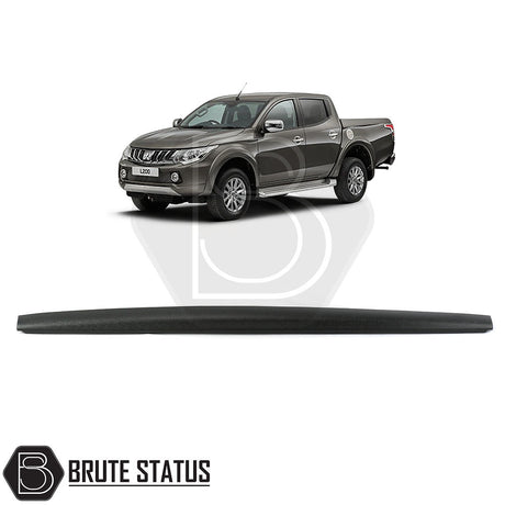 Mitsubishi L200 Series 5 2015-2019 Tailgate Protector, molded black plastic, fits snugly on truck edge, complements bed liners, enhances vehicle's functionality.