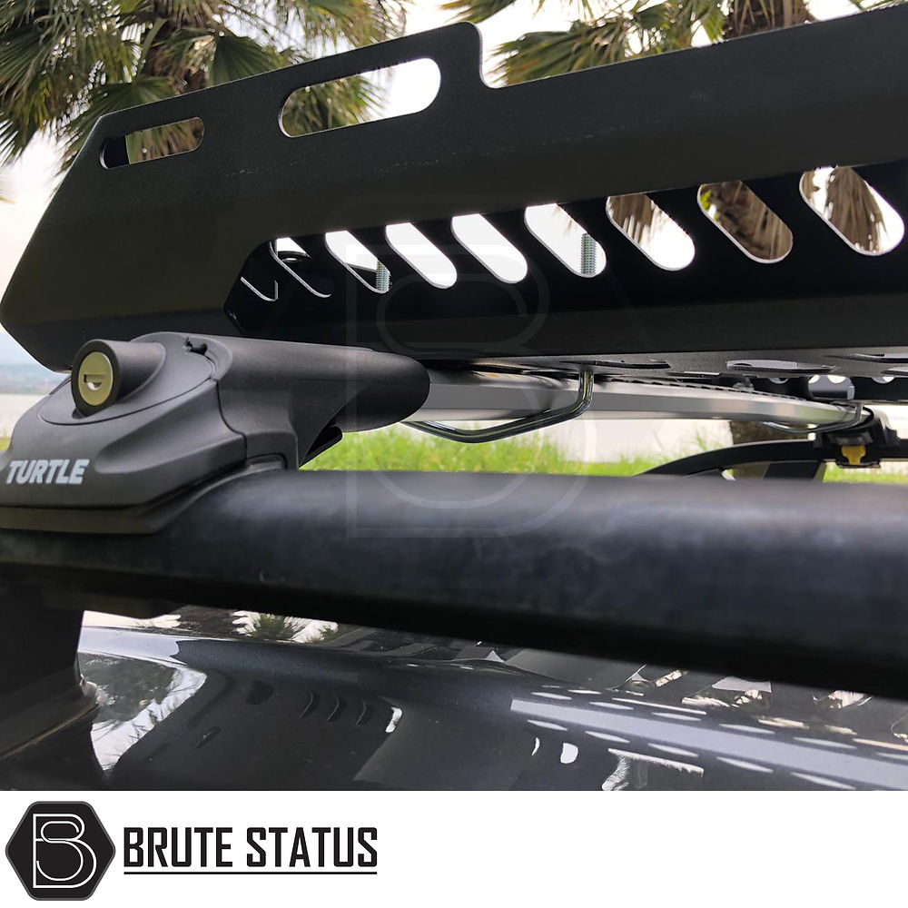 Universal Roof Basket (Combat Style) on a truck, featuring a matte black, heavy-duty steel construction, designed for easy installation with mounting points, suitable for trucks with pre-installed cross bars.