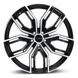 Romac Wheels Catalina, featuring a sleek black and white rim, ideal for enhancing the style and performance of your vehicle.