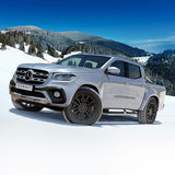 Hawke Wheels Denali on a silver truck in snow, showcasing aftermarket style for enhanced individuality and performance.