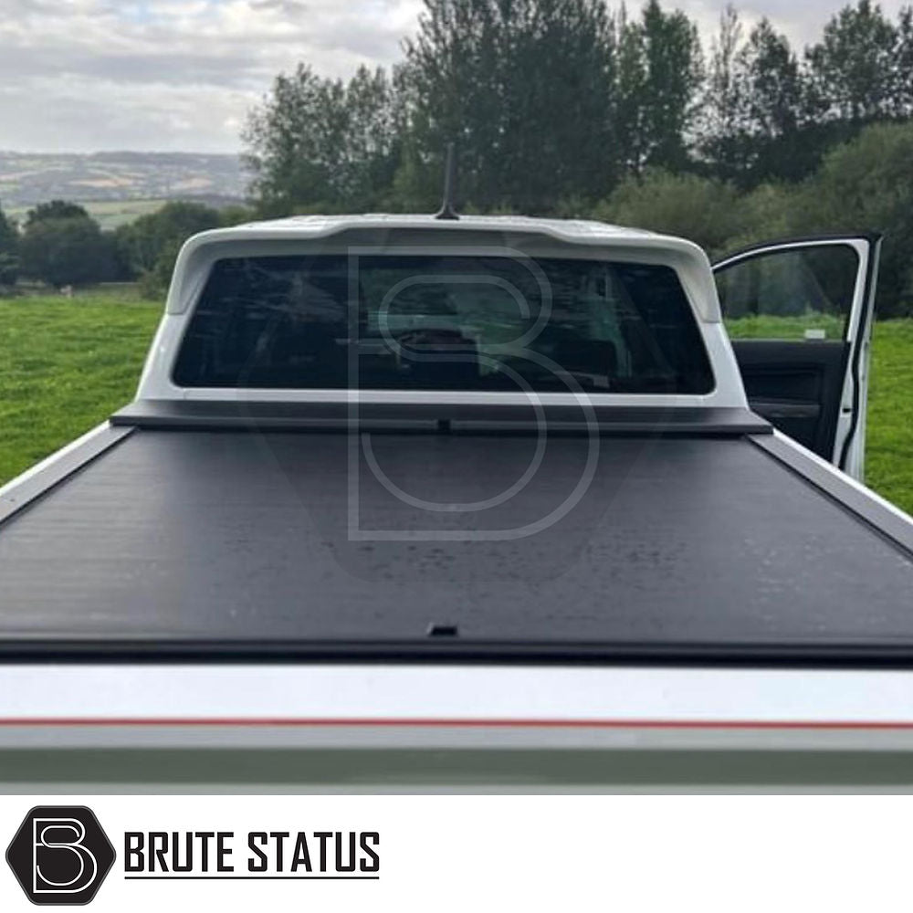 Ford Ranger 2012-2022 Roof Spoiler displayed on a truck with open doors, highlighting its aerodynamic design and compatibility features with rear brake light integration.